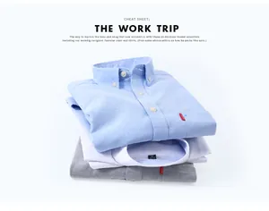 Stacked light blue, white, and gray Oxford cloth shirts with button-down collars.