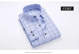 Folded light blue plaid shirt with dark buttons and orange grid pattern detail.