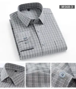 Vista dettagliata della camicia di cotone a quadri grigi con colletto, trama e bottoni