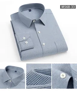 Dettaglio di una camicia da uomo a quadri in cotone spazzolato con trama e bottoni.