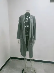 Close-up of women's loose grey long-sleeved open cardigan coat with side pockets.