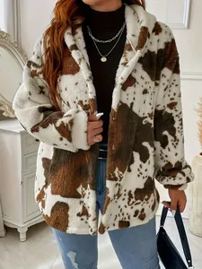 Detail shot of a fuzzy cow print hooded jacket for women's autumn winter fashion.