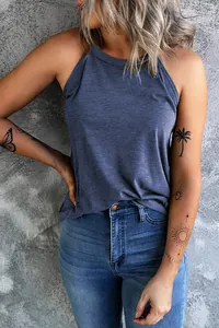 Close-up of a women's dark blue halter-neck tank top in a minimalist summer style.