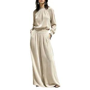 Elegant champagne goud fluwelen set met top met lange mouwen en wijde broek voor dames