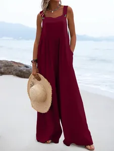 Detail showing the relaxed fit of wine red linen cotton wide leg summer jumpsuit