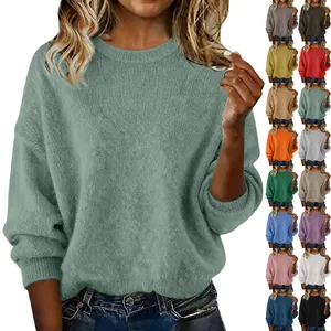 Detailed view of the loose crew neck sweater with various color options available