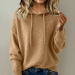 Close-up of cozy camel-colored loose knit drawstring hoodie sweater for women's fashion
