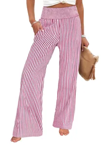 Fashionable high-waisted wide-leg trousers featuring vertical stripes and smocked waist detail