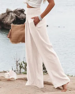 Pantalon large beige en coton et lin avec taille haute élastique et poches latérales