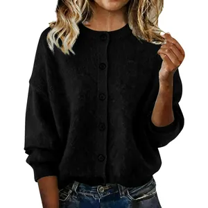 Detailed view of the soft knit texture on this women's black button-down cardigan sweater