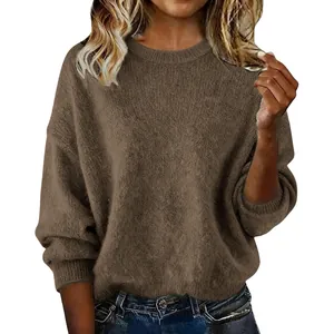 Detailed view of soft brown loose crew neck sweater for women featuring a fuzzy texture