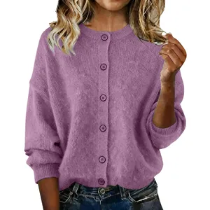 Detail showing a soft purple knitted cardigan with matching buttons on a model