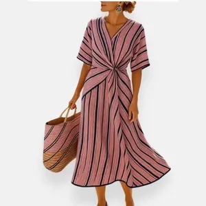 Elegant pink striped V-neck midi dress with twisted waist and irregular hemline.