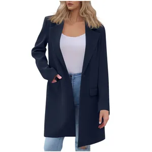 Close-up of elegant navy blue long sleeve lapel coat for women on model