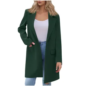 Macro view of dark green mid-length lapel coat for women, showcasing texture and buttons