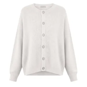 Detailed macro view of soft white knit cardigan with round neck and buttons