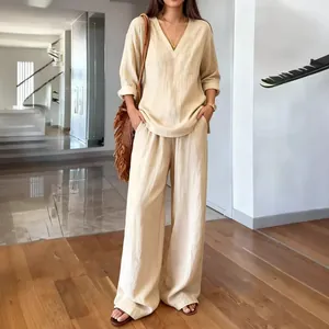 Set casual due pezzi in lino beige con top a maniche lunghe e pantaloni larghi