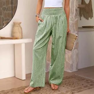 Stylish high-waisted green gingham wide-leg pants for women with comfortable smocked waist