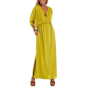 Elegante abito lungo verde lime con scollo a V, vita alta, maniche a pipistrello e spacco