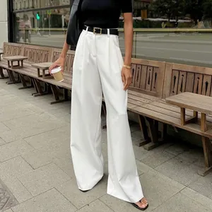 Elegant high-waist wide-leg white suit trousers for women, modern street style fashion look