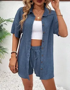 Casual blue two-piece set featuring a textured button-down shirt and drawstring shorts
