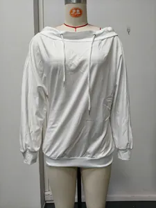 Close-up detail showing the off-shoulder neckline and drawstring of the white sweatshirt.