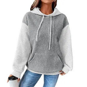 Women's oversized grey and white color block waffle knit hoodie with kangaroo pocket