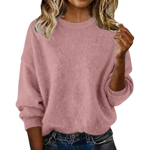 Close-up of a women's soft mauve crew neck sweater with a cozy loose fit design.