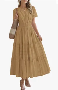 Detail view of khaki v-neck tiered maxi dress with smocked waist and puff sleeves