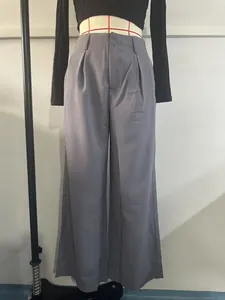 Elegant high-waisted grey straight-leg trousers on mannequin for professional attire