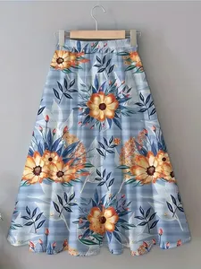 Detailansicht eines böhmischen Midi-Rocks mit Blumenmuster und hoher elastischer Taille