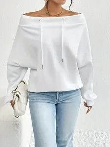 Detailed shot of a white off-the-shoulder sweatshirt with drawstring and boat neck