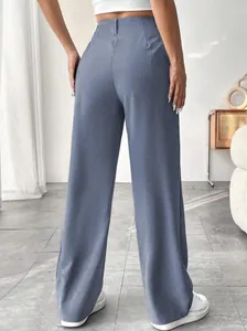 Back view of elegant high-waisted dusty blue straight-leg trousers with a flattering fit