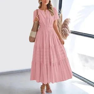 Elegant pink V-neck layered maxi dress featuring puff sleeves and smocked waist design
