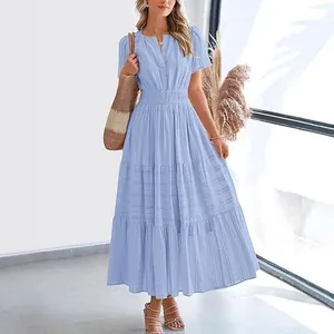 Elegant light blue V-neck tiered maxi dress with stylish pleated puff sleeves for summer.
