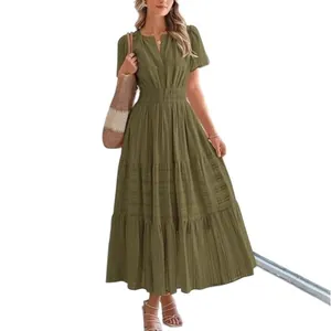 Elegant olive green V-neck tiered maxi dress with puff sleeves and pleated waist