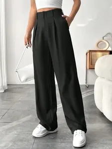 Elegant high-waisted black wide-leg trousers featuring sophisticated front pleats