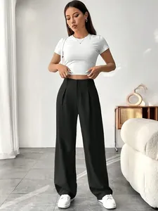 Full view of elegant high-waisted black straight-leg trousers on a model