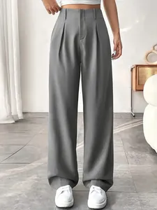 Detail shot of elegant gray high-waist straight-leg trousers for professional wear