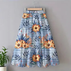 Falda midi bohemia de cintura alta elástica con un vibrante estampado floral y de rayas