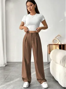 Professional full length view of elegant high-waisted brown straight-leg trousers