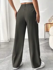 Back view of elegant high-waisted straight-leg suit pants in dark olive green finish