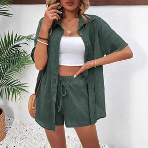 Women's 2-piece summer set with green short sleeve shirt and drawstring shorts