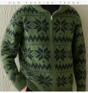 Macro view showing the detailed knit texture and snowflake pattern of this green cardigan