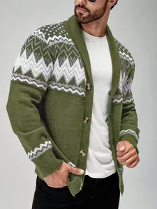 Detail of green men's cardigan showing Nordic geometric knit pattern and shawl collar.
