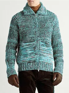 Detailed texture of men's chunky knit zip-up cardigan with turquoise and black pattern