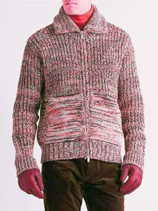 Detailed view of men's chunky knit zip-up cardigan in variegated brown and red tones.