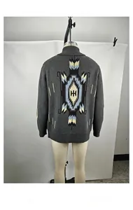 Back view of vintage shawl collar cardigan with southwestern jacquard pattern