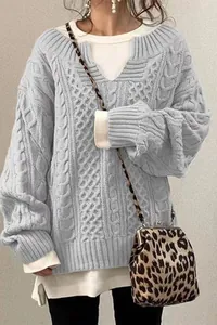 Maglione in maglia a trecce da donna largo in azzurro dal design minimalista in stile pigro