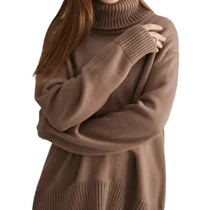 Close-up detail of a soft brown turtleneck knit pullover with ribbed texture